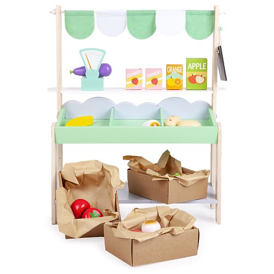 Drewniany stojak sprzedażowy z warzywami